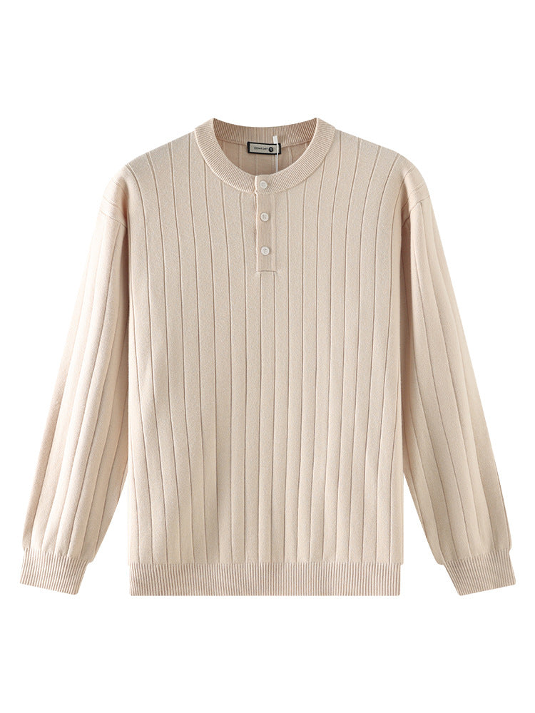 Mens Henry wears a vertical stripe knitted sweater.