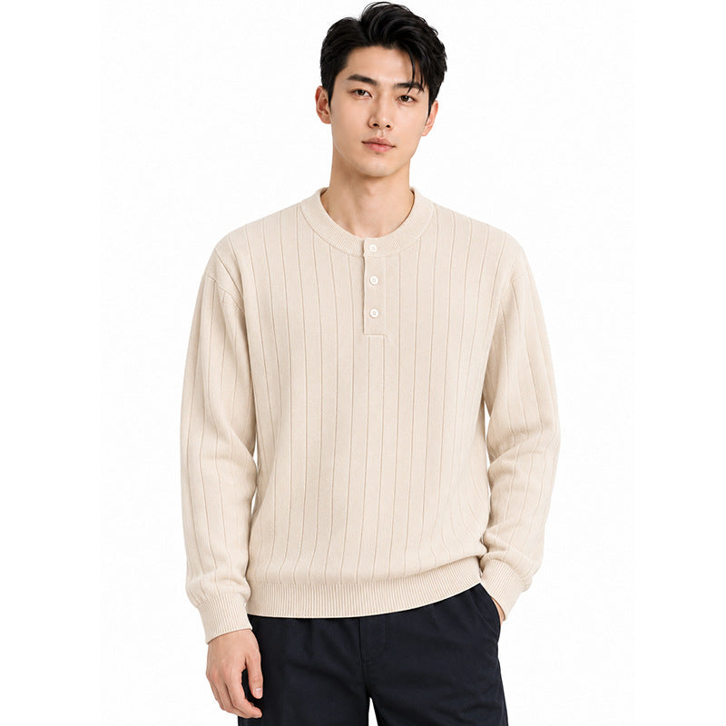 Mens Henry wears a vertical stripe knitted sweater.