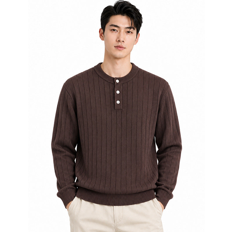 Mens Henry wears a vertical stripe knitted sweater.