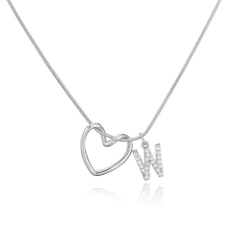 Elegant and versatile copper pendant necklace with zircon-inlaid heart and letter design