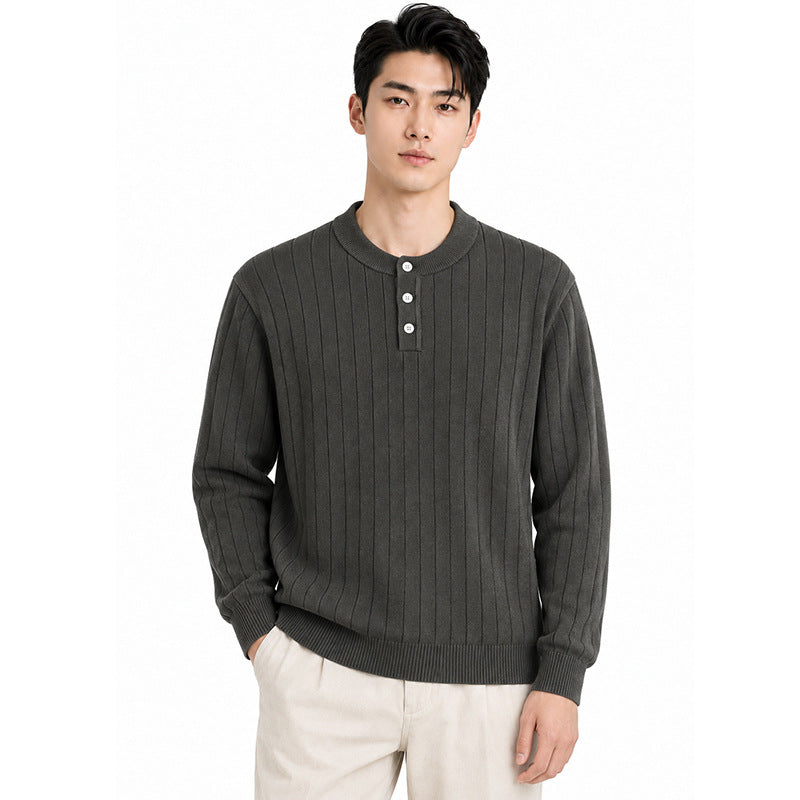 Mens Henry wears a vertical stripe knitted sweater.