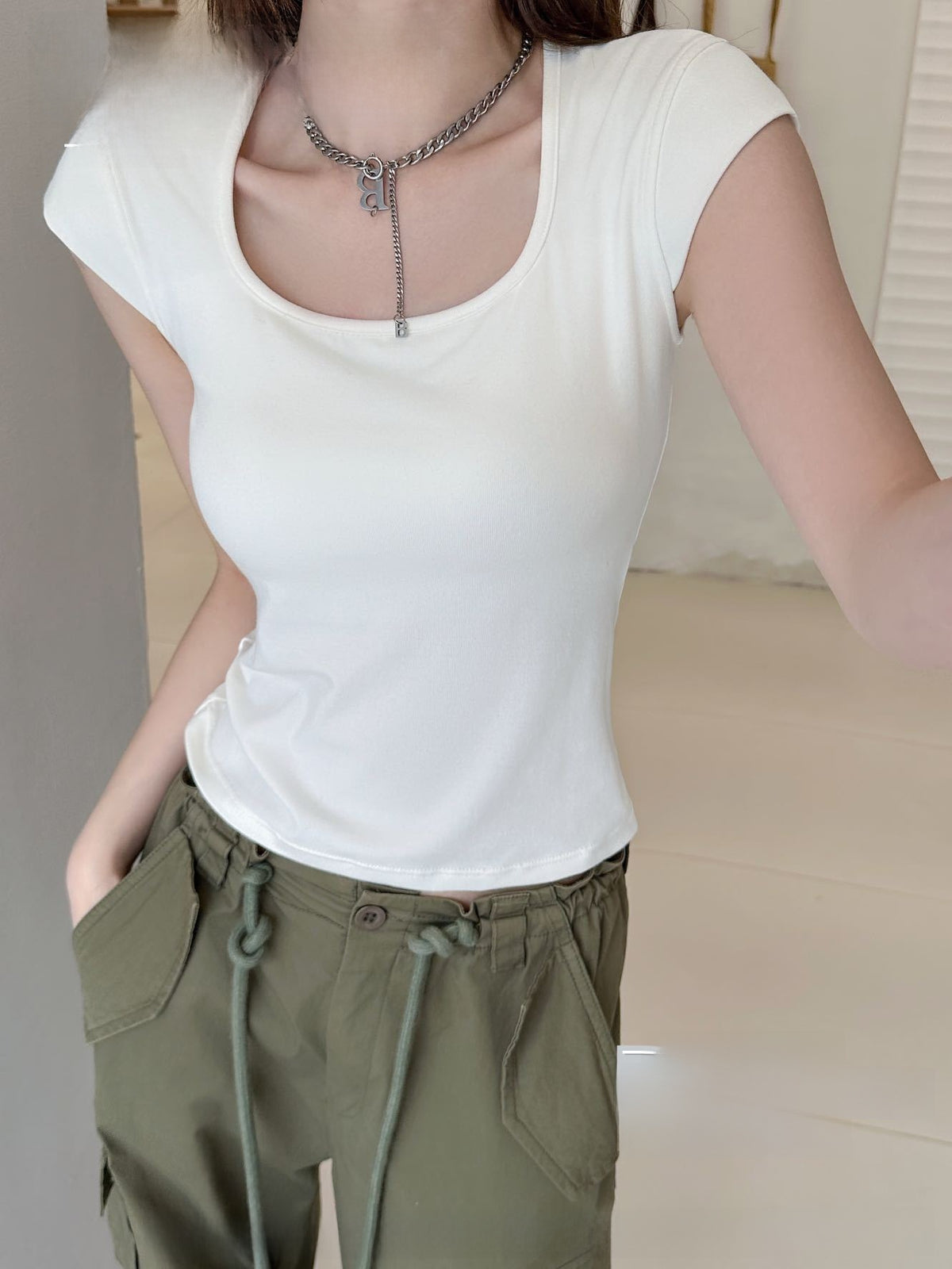 Flutter-sleeve T-shirt with built-in bra pads