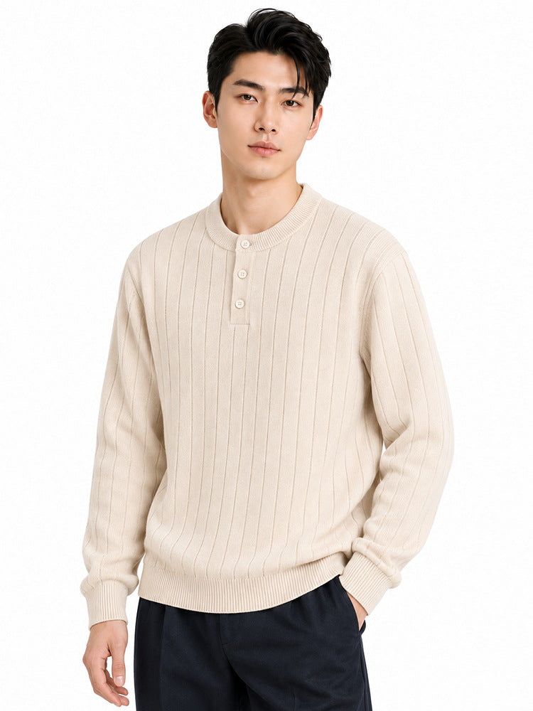 Mens Henry wears a vertical stripe knitted sweater.