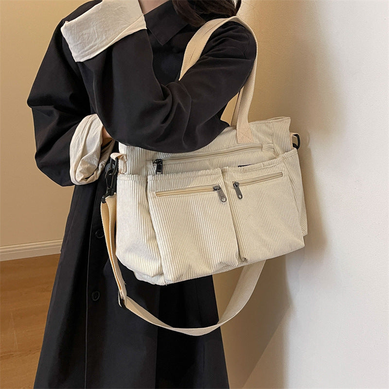 Large-capacity corduroy shoulder bag with slanted strap